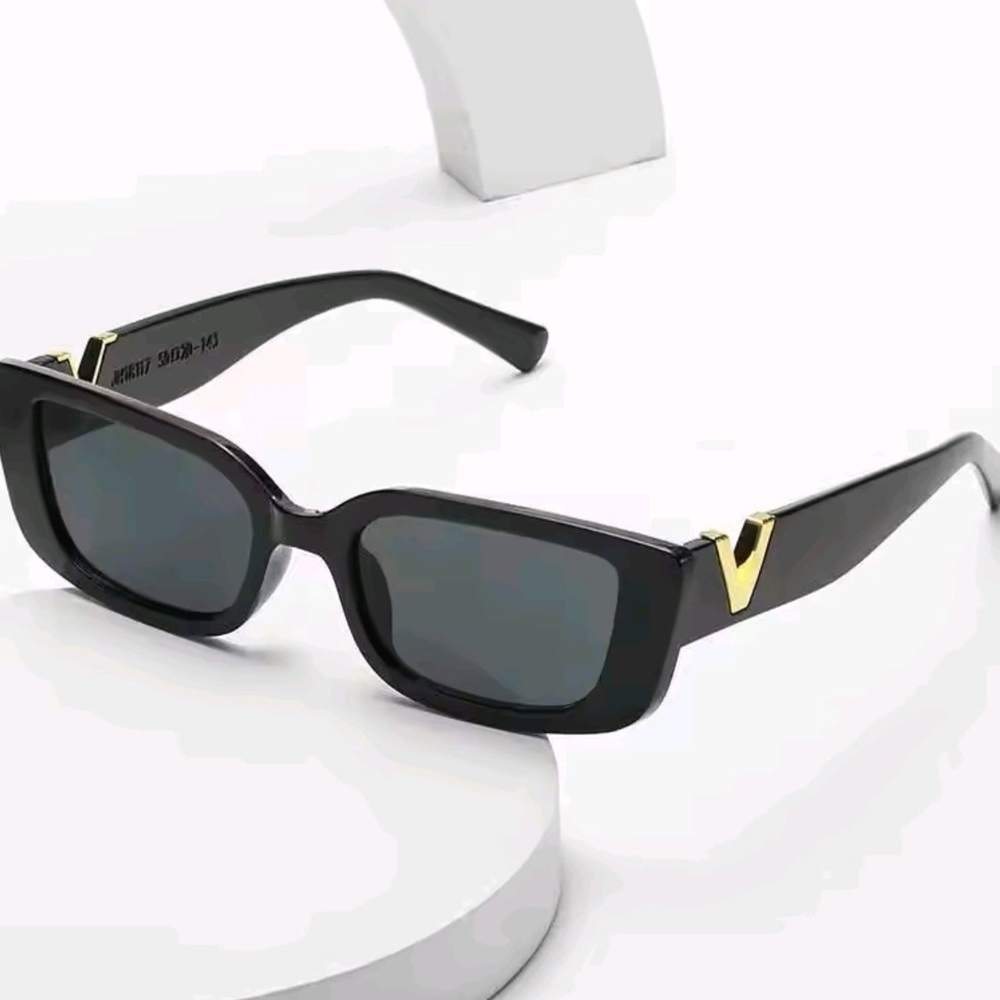 Stylish Black Sunglasses with Gold Accent